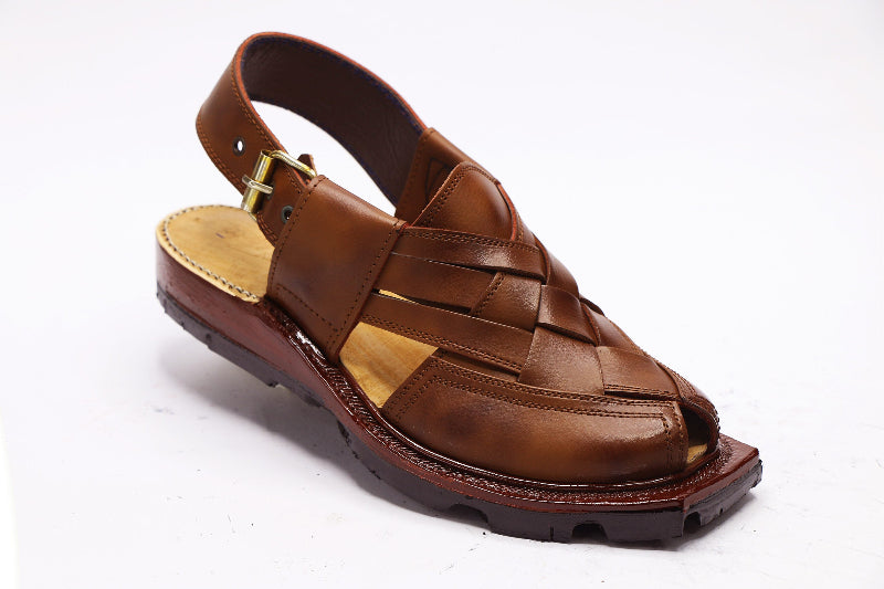 Brown sandal with braided design on a white background